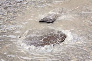 storm drains during rain